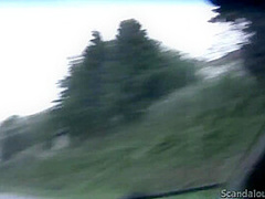 Hot Babe rubbing a cock while the guy driving caught on tape