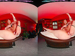 Curvy redhead shoves a toy up her ass in virtual reality