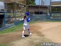 Little April rubs her pussy after baseball