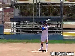 Little April rubs her pussy after baseball