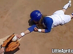 Little April rubs her pussy after baseball