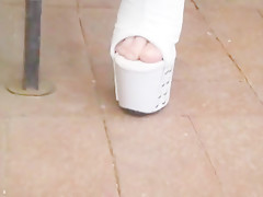 Footplay in white studded platform mules