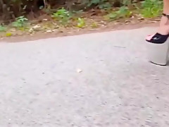 Walking with extreme plateau high heels