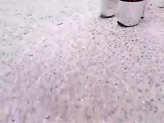 Walking with extreme plateau high heels