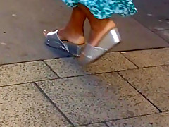 Candid ebony mature in wedge sandals