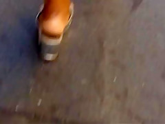Candid ebony mature in wedge sandals