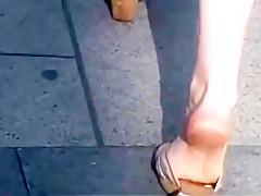 Candid mature pink soles in well worn wedges