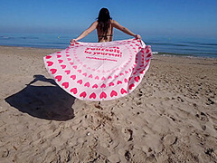 Bikini Fanatic enjoys herself on the beach!
