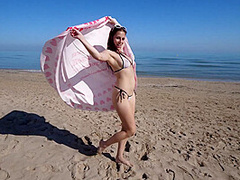 Bikini Fanatic enjoys herself on the beach!