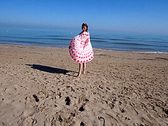 Bikini Fanatic enjoys herself on the beach!