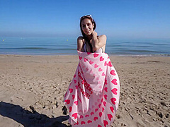 Bikini Fanatic enjoys herself on the beach!