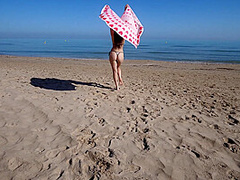 Bikini Fanatic enjoys herself on the beach!