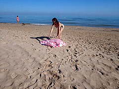 Bikini Fanatic enjoys herself on the beach!