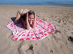 Bikini Fanatic enjoys herself on the beach!