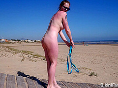 Pale redhead bikini amateur in a sling
