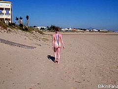 Pale redhead bikini amateur in a sling