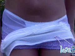 Busty stripteasing MILF shakes her booty