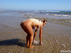 Fake tits bikini model in public