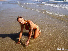 Fake tits bikini model in public