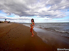 Cutie shows her tight bikini body