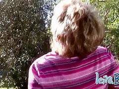 Leila Babe striptease out with Medium Tits and shaved pussy