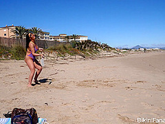 Big ass bikini amateurs playing beach tennis