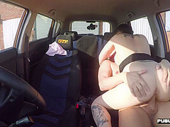 Busty MILF fucked outdoor in the car after driving lesson