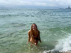 Pierced bikini babe on the beach