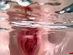 Red XXX masturbates poolside with an ice dildo