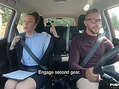 Busty MILF fucked outdoor in the car by driving student