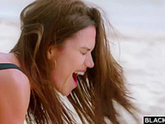 Fit brunette is having interracial sex on the beach with a handsome, black guy she likes