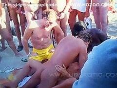 Public Sex On A Nude Beach Pleasing The Crowd