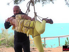 Public whore suspension bondage exposed with buttplug in ass