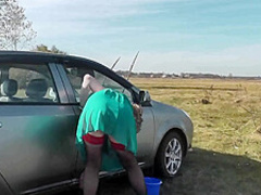 Milf Beautiful Sexy Blonde Outdoors On River Bank Washes Car Without Panties And Bra Under Dress. No Panties In Public
