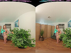 Skinny blonde strips from her bikini and masturbates in VR