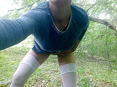 In Nature Changes Into Stockings And A Dress Fucks Herself And Makes Pissing Close-up
