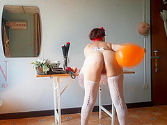 The Naked Secretary In The Office With White Apron Blows Balloons Masturbates