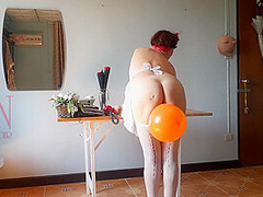 The Naked Secretary In The Office With White Apron Blows Balloons Masturbates