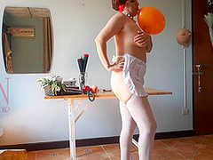 The Naked Secretary In The Office With White Apron Blows Balloons Masturbates