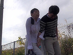 Mature Japanese wife remote control vibrator outside stroll