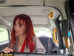 Redhead horny babe rides taxi driver in his car outdoor