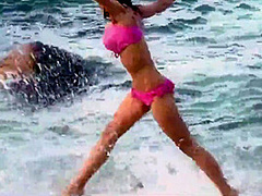 Busty Babe Vallory In The Surf