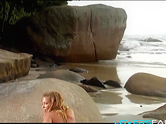 Stripteasing beach blonde anal babe