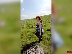 Hot MILF Red XXX goes for a topless walk on Easter