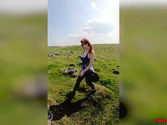 Hot MILF Red XXX goes for a topless walk on Easter