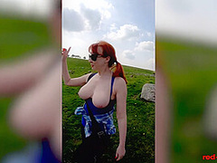 Hot MILF Red XXX goes for a topless walk on Easter