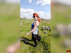 Hot MILF Red XXX goes for a topless walk on Easter