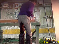 Classy Asian Urinating In Public Park