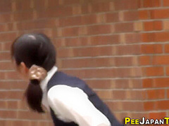 Classy Asian Urinating In Public Park