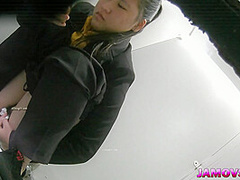 Hairly Asian teen pussy captured peeing